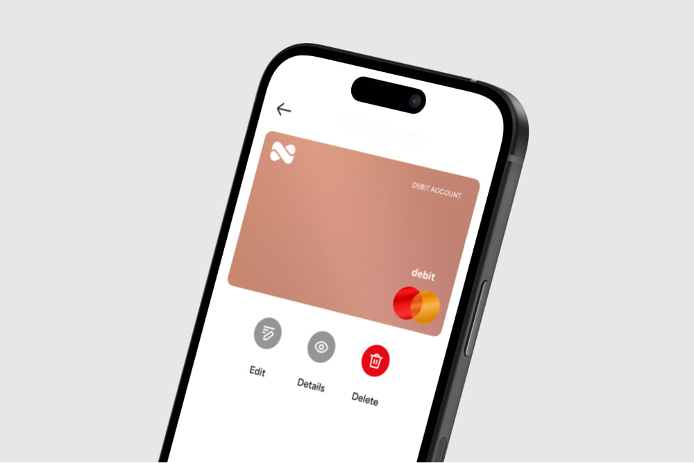 Netspend Rose colored debit Mastercard shown in the app